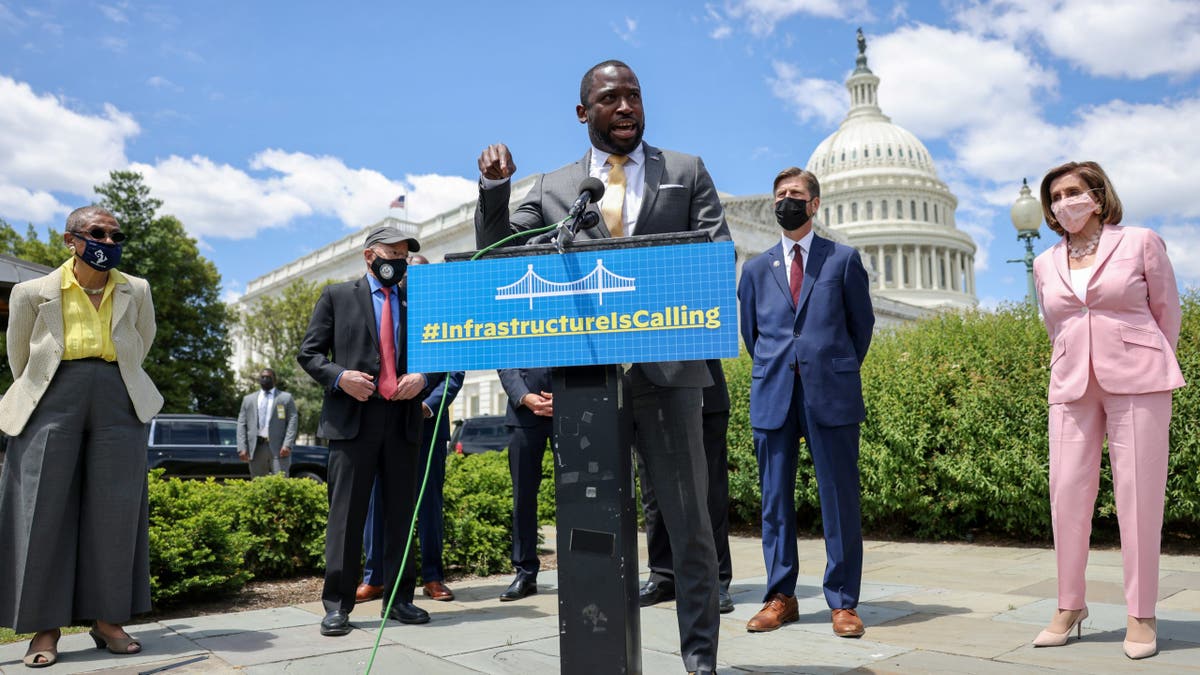 Recently-departed Richmond Mayor Levar Stoney speaks on infrastructure alongside Del. Eleanor Holmes-Norton, D-DC, and Rep. Nancy Pelosi, D-CA.