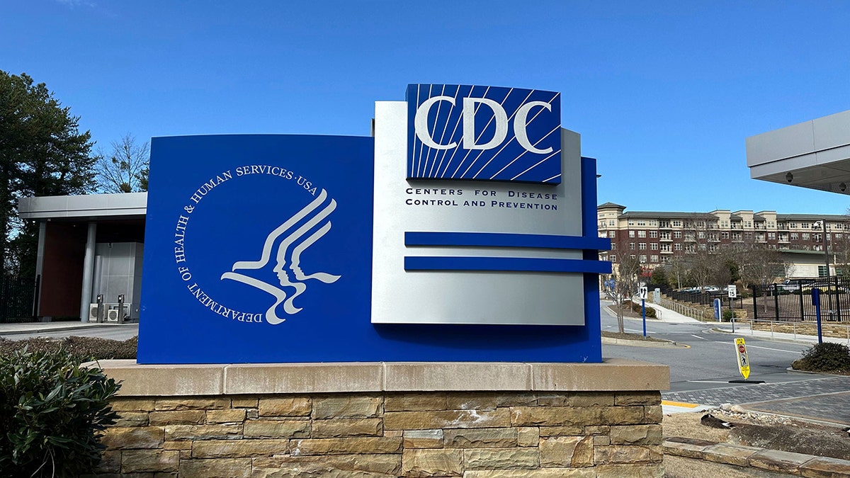 sign stands at an entrance to the main campus of the Center for Disease Control and Prevention