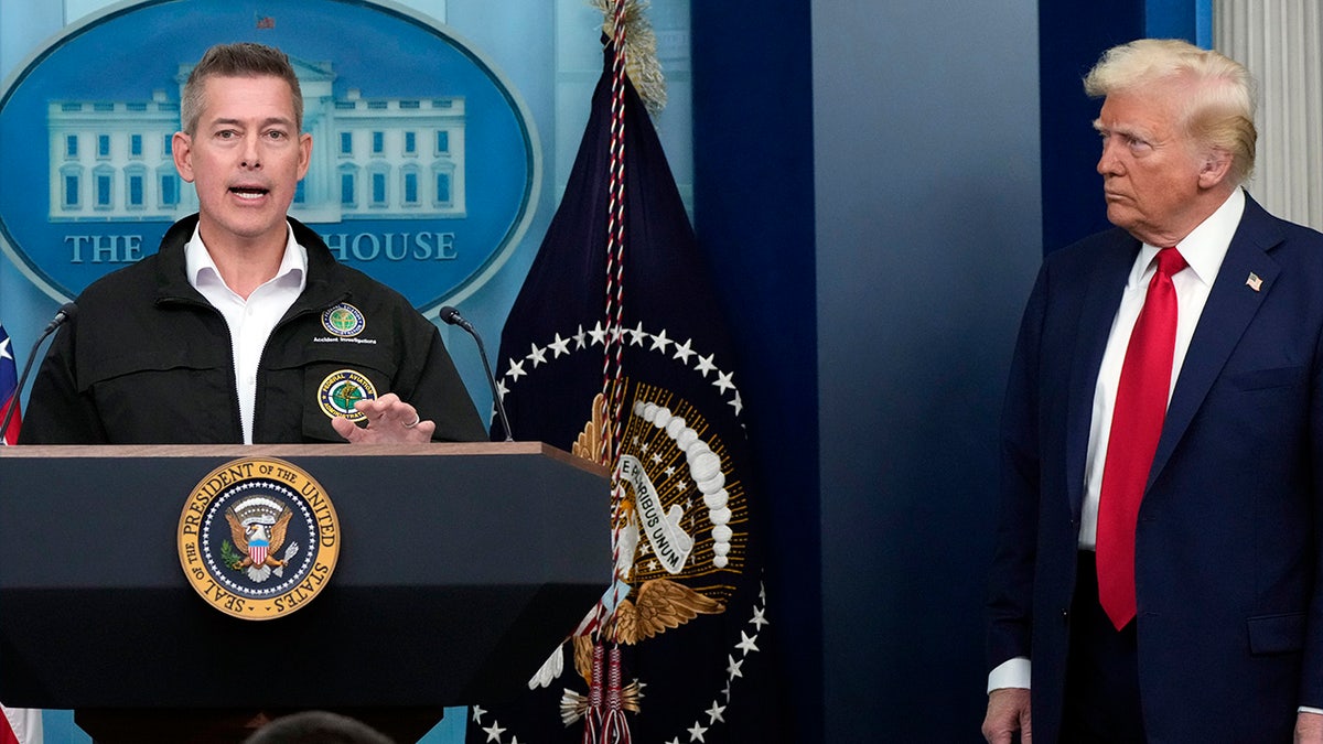 President Donald Trump listens as Transportation Secretary Sean Duffy speaks in the James Brady Press Briefing Room