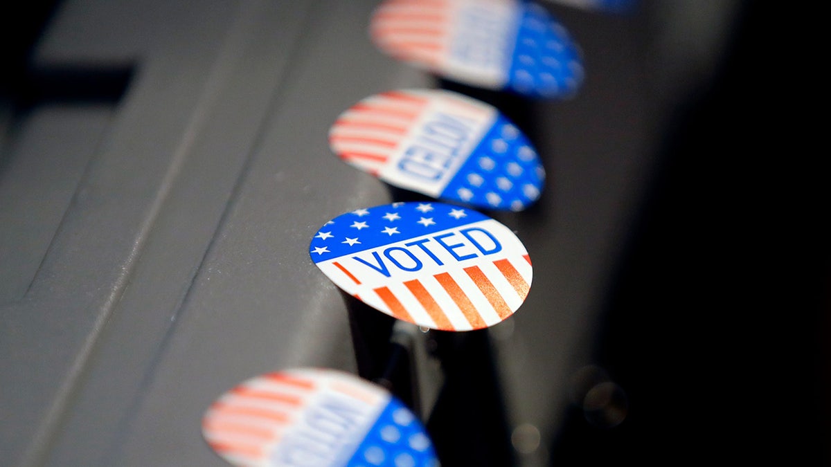 I Voted stickers are ready to be given out as citizens go through the voting process at Scheig Center & Gardens on Election Day