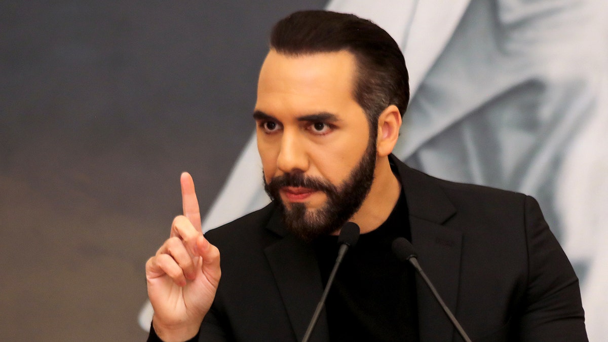 President of El Salvador Nayib Bukele holds index finger up