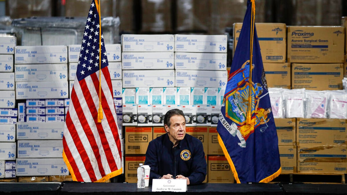 Gov. Andrew Cuomo speaks during a news conference against a backdrop of medical supplies at the Jacob Javits Center that will house a temporary hospital in response to the COVID-19 outbreak in New York. 