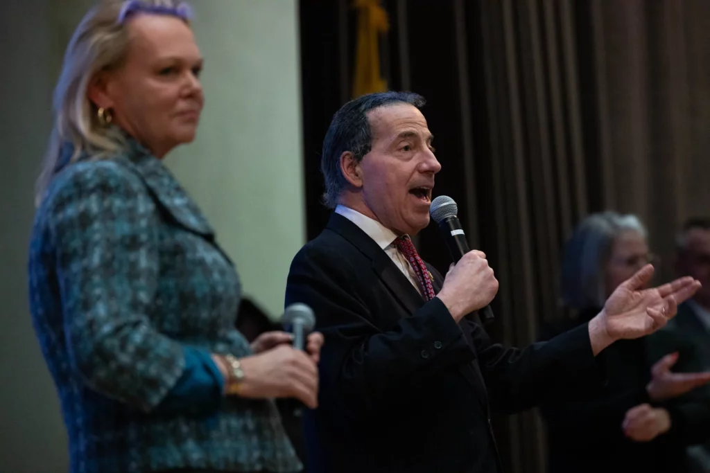 Reps. April McClain Delaney (D-MD), left, and Jamie Raskin (D-MD) host a town hall in Frederick, Maryland, Wednesday, March 19, 2025.