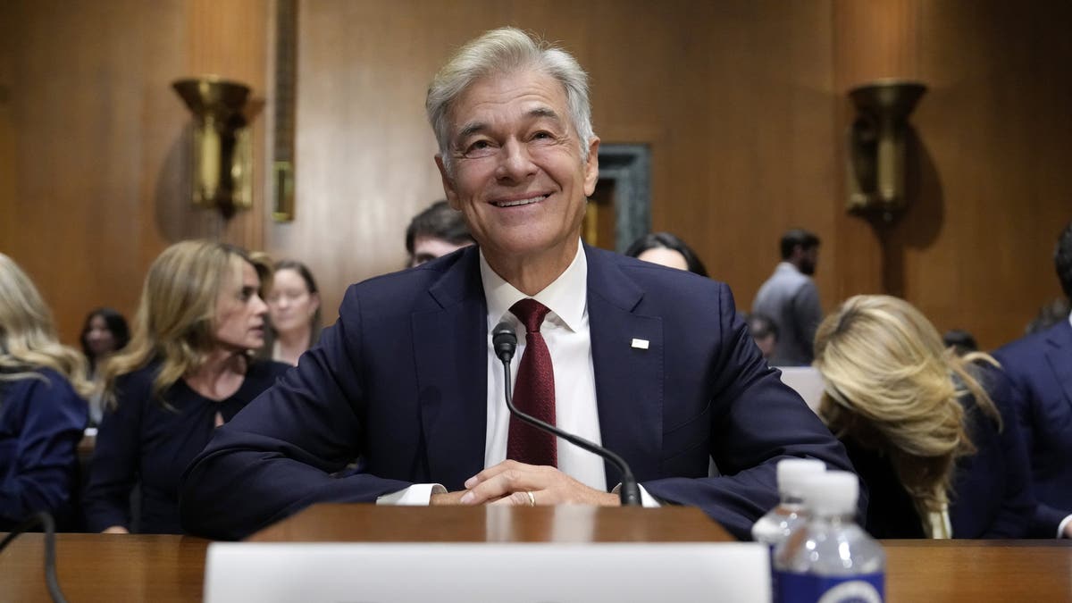 Dr. Mehmet Oz, President Donald Trump's pick to lead the Centers for Medicare and Medicaid Services, sits before testifying at his confirmation hearing before the Senate Finance Committee, on Capitol Hill in Washington, Friday, March 14, 2025. (AP Photo/Ben Curtis)