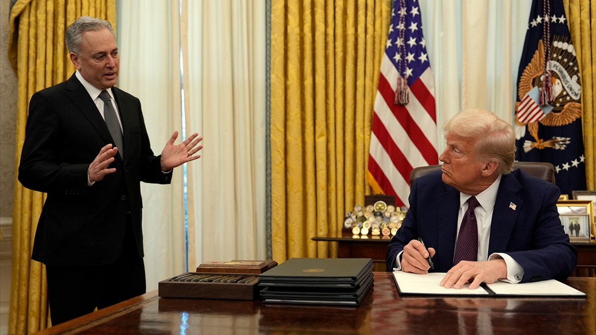 David Sacks in Oval Office, speaking to President Trump, seated