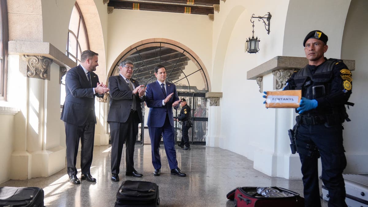 Rubio with his Guatemalan counterparts watching a simulated drug bust 