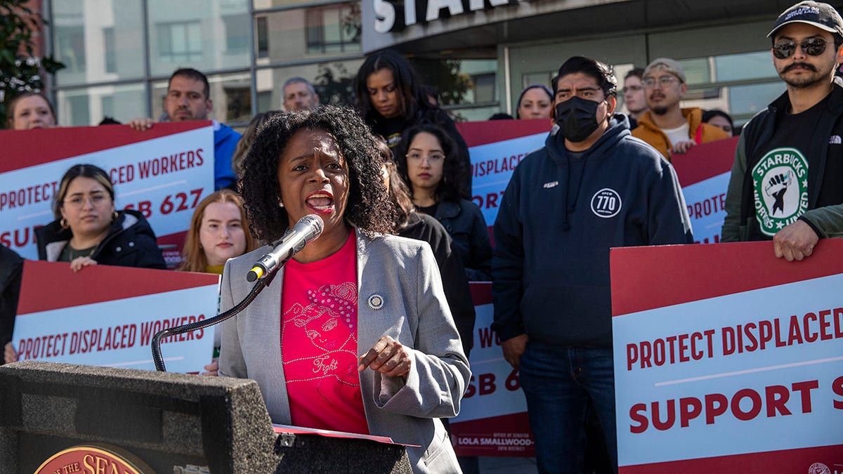 Lola Smallwood-Cuevas speaking at an event