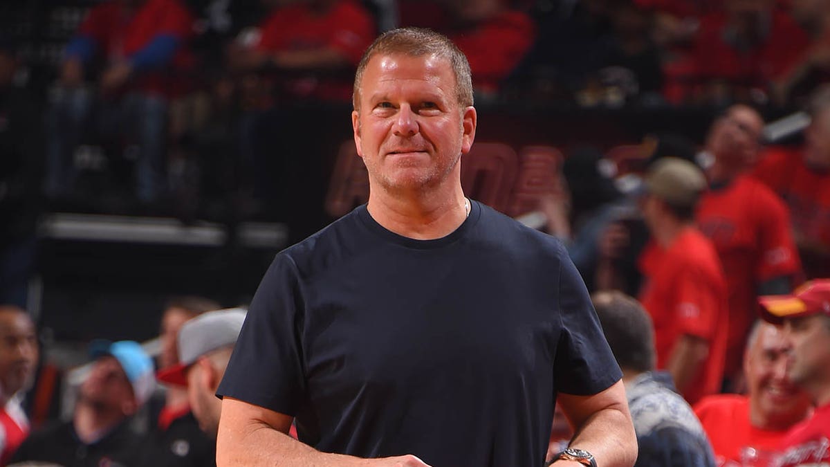 Tilman Fertitta on court