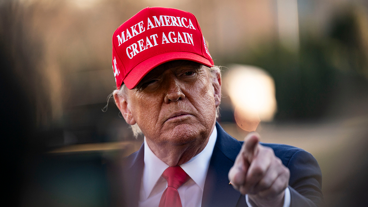 President Donald Trump in red MAGA hat 