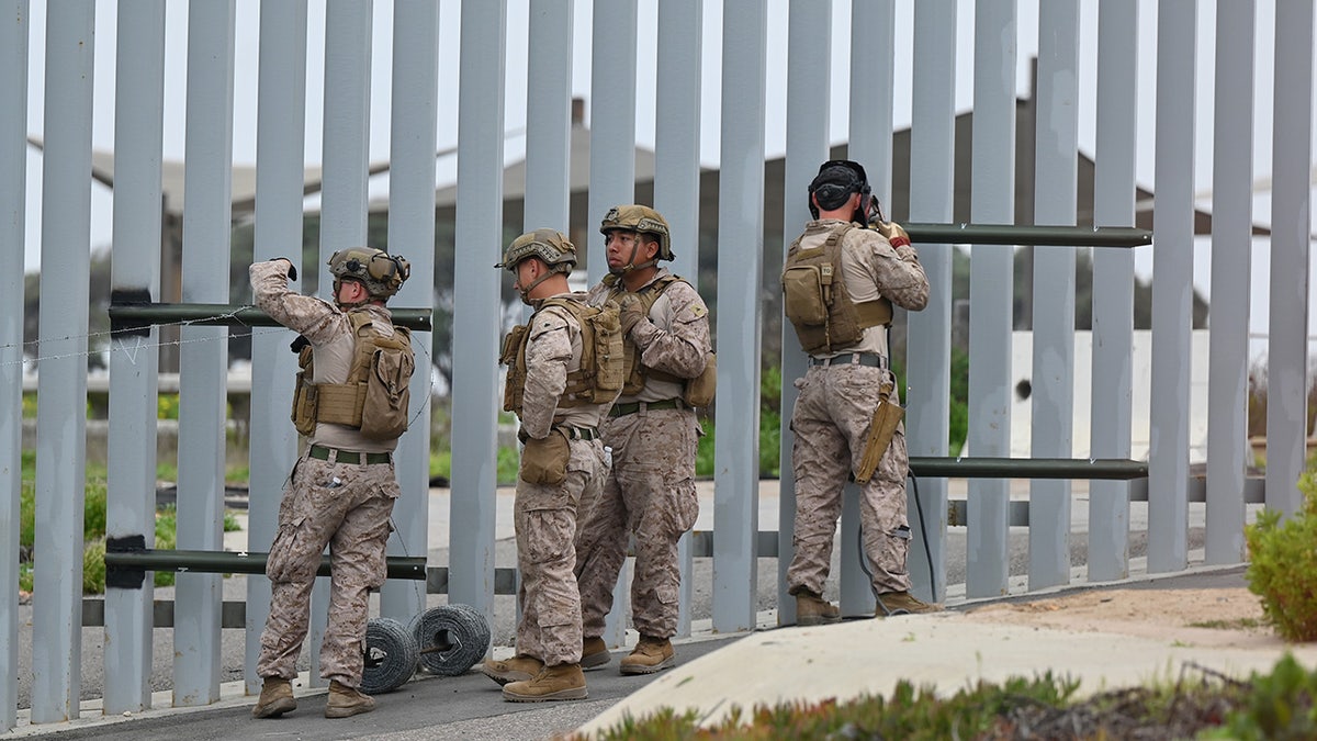 Marines at border wall