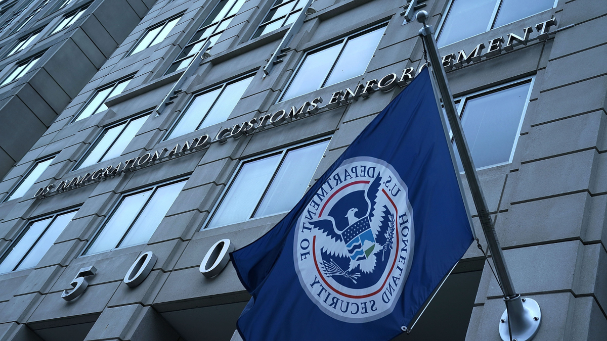 ICE HQ with flag outside building