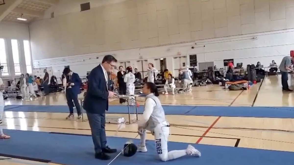 Fencer Stephanie Turner takes a knee instead of competing against a trans competitor