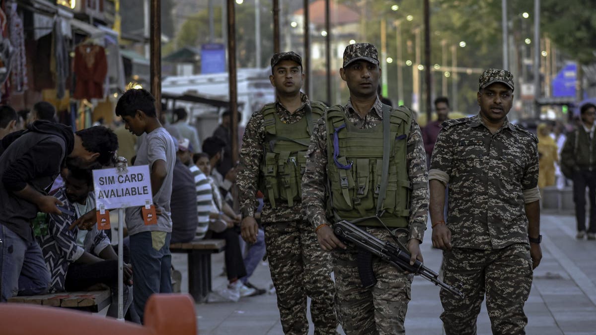 Indian paramilitary soldiers on patrol