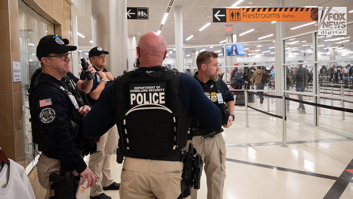 Scenes at the airport as REAL ID requirements go into effect