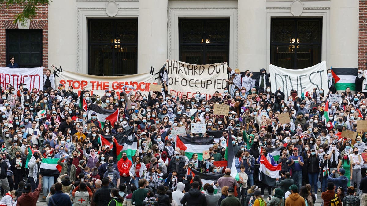 Demonstrators take part in an "Emergency Rally: Stand with Palestinians Under Siege in Gaza," amid the ongoing conflict between Israel and the Palestinian Islamist group Hamas, at Harvard University in Cambridge, Massachusetts, U.S., October 14, 2023. 