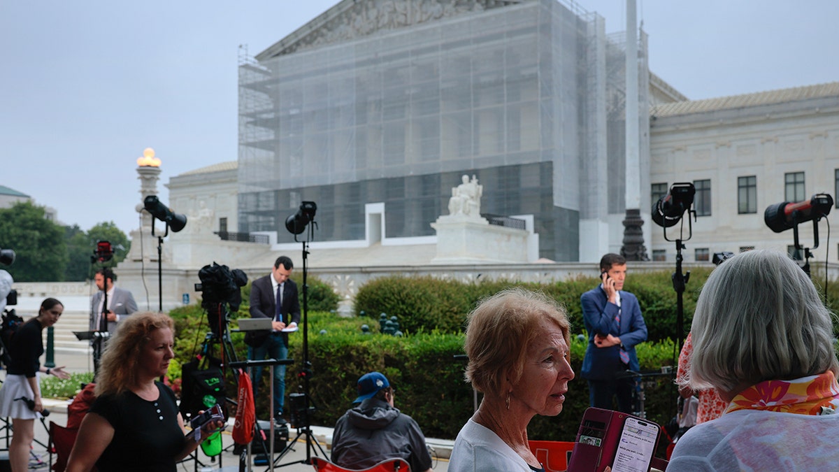 Journalists outside Supreme Court