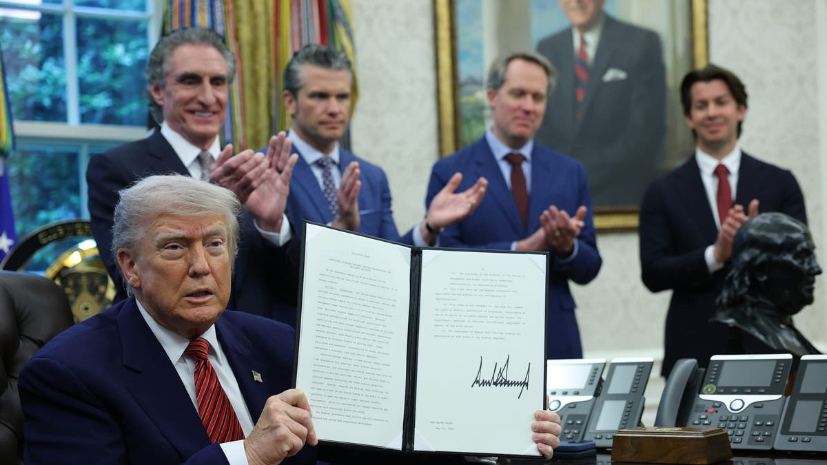 President Donald Trump pointed to the power a U.S. president can wield with his signature alone.