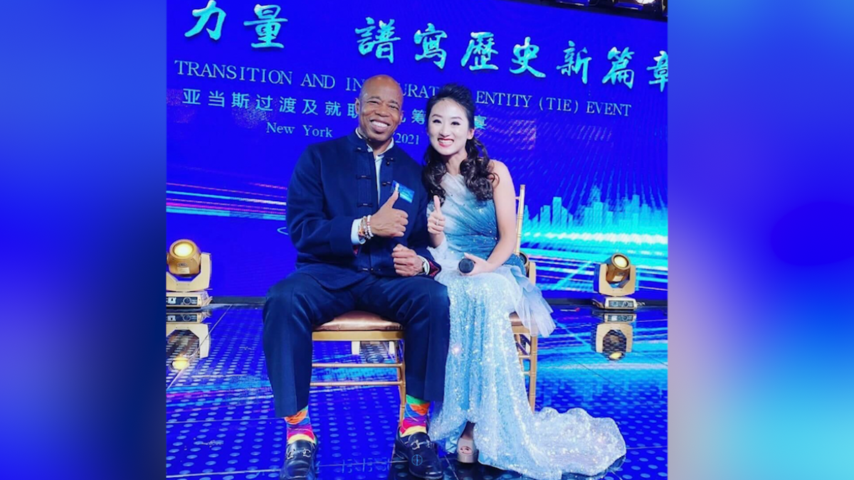 Linda Wang and Eric Adams