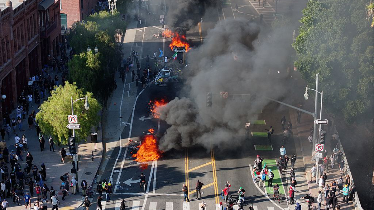 LA Riots fire on street, black smoke