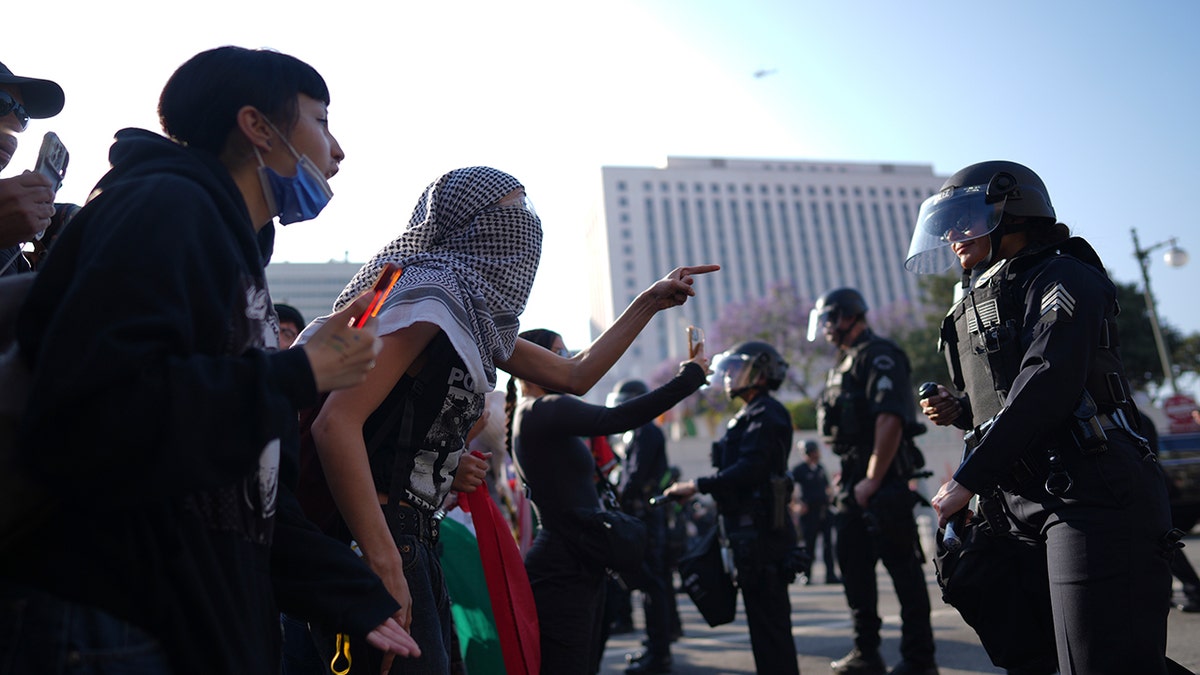 LA rioter, law enforcement stand off