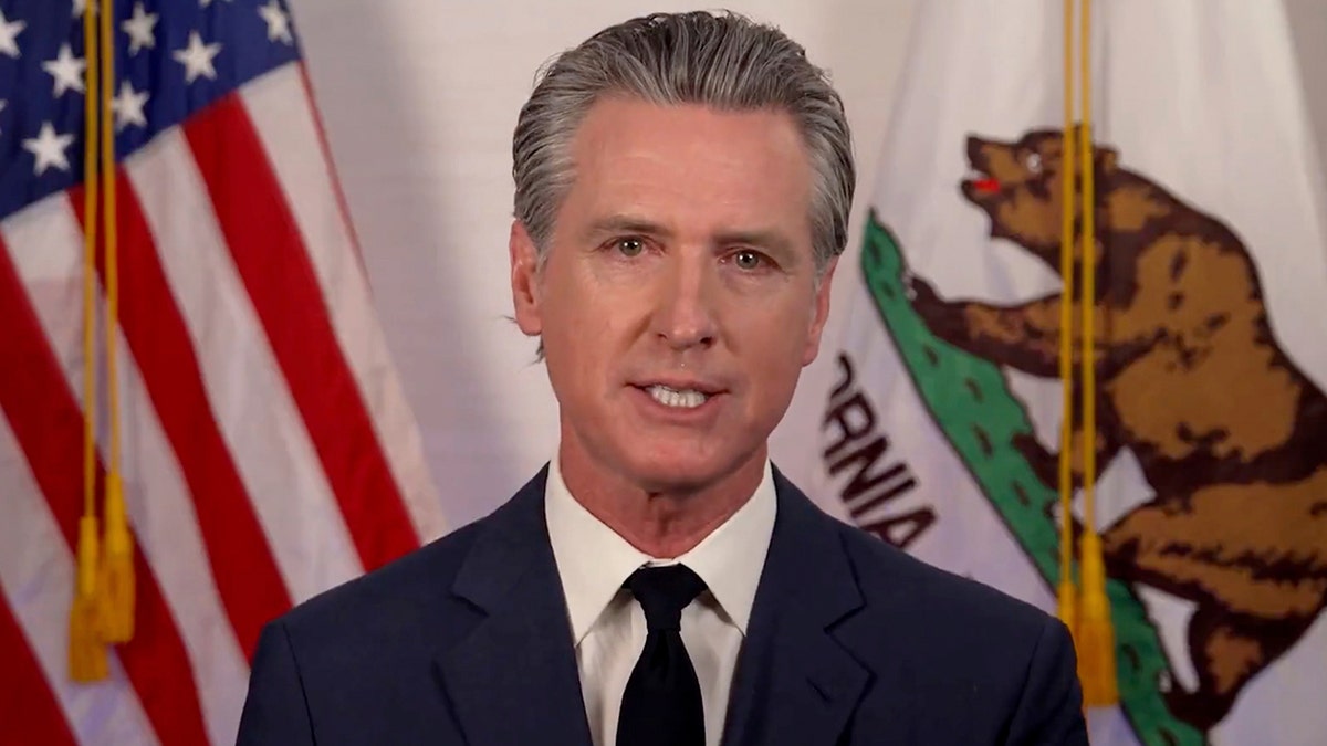 Newsom video address in front of American and Californian flags