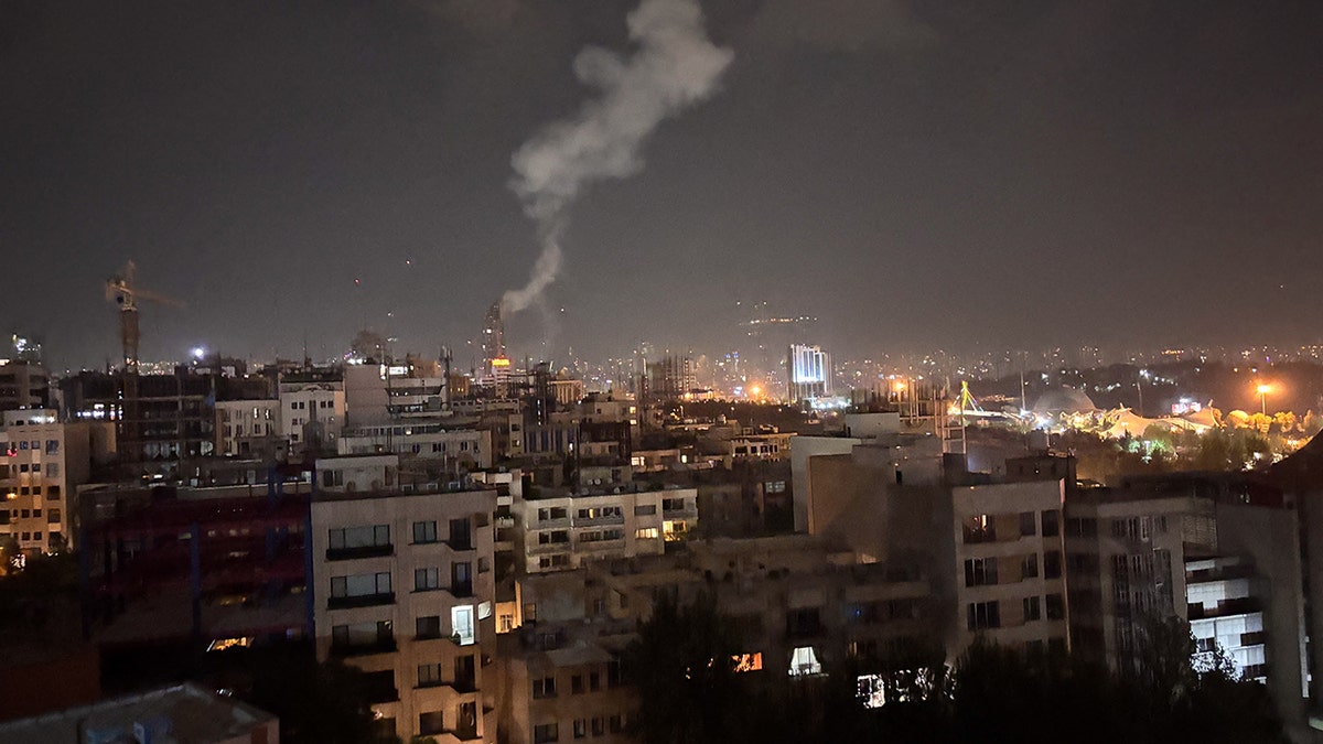 Smoke rises in Tehran, Iran following bombings executed by Israel.