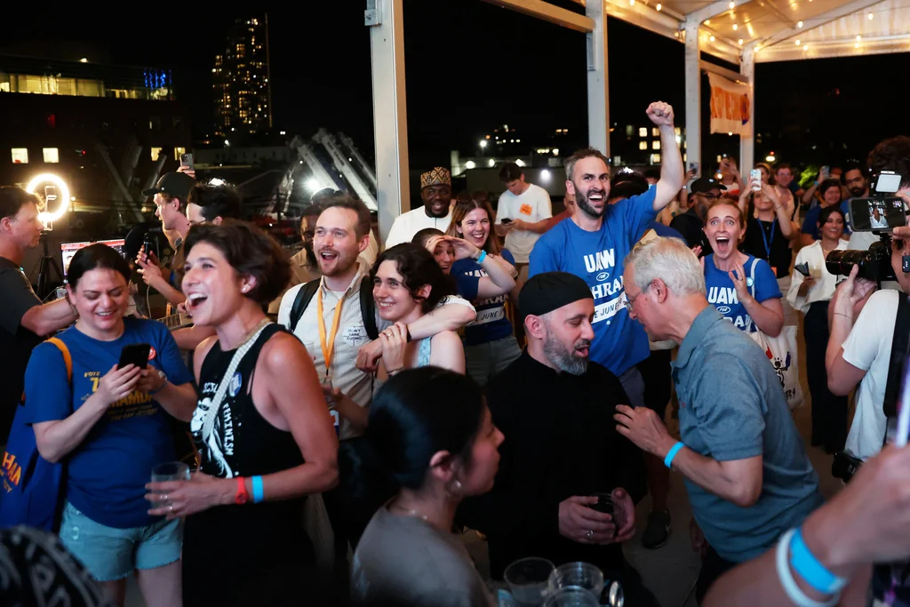 Supporters of Democratic mayoral candidate Zohran Mamdani cheer as they watch results come in at his primary election party, Tuesday, June 24, 2025, in New York. (AP Photo/Heather Khalifa)