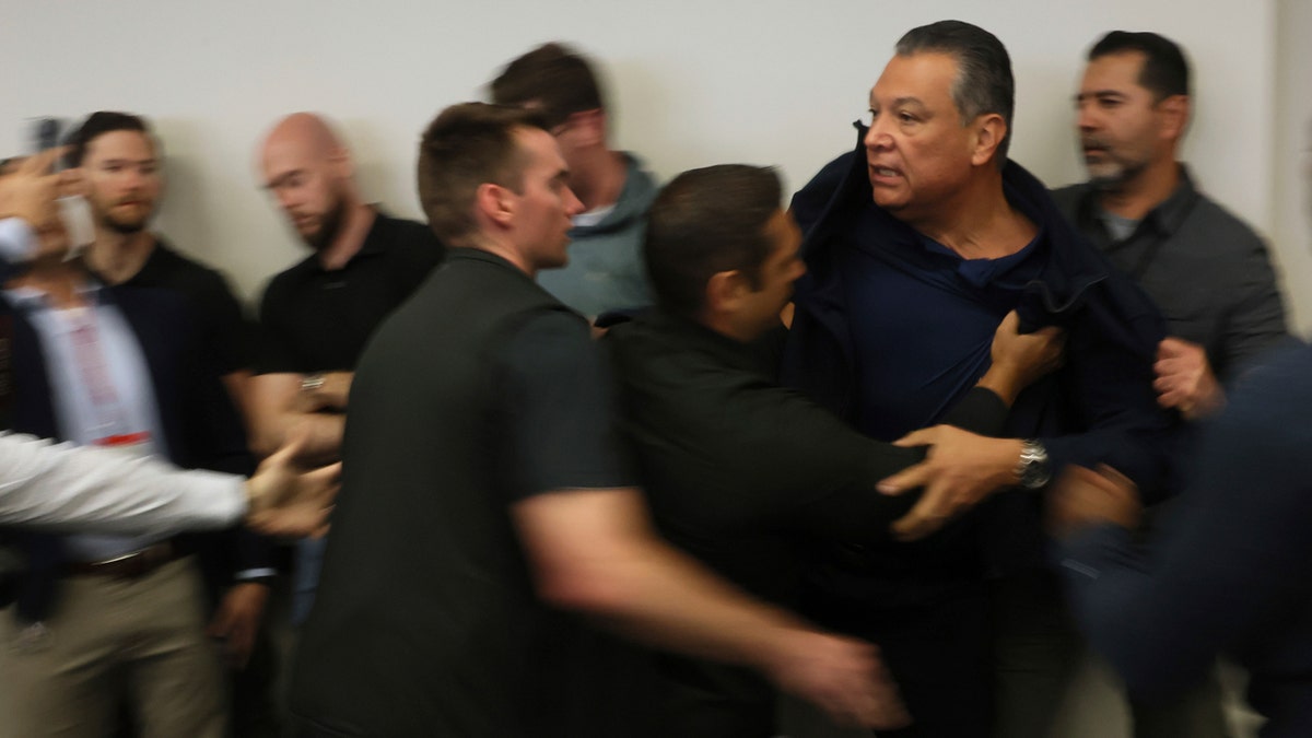 Sen. Alex Padilla escorted