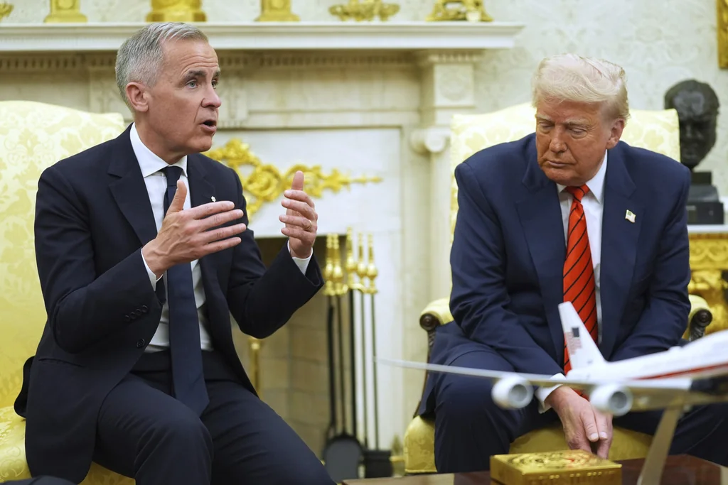 President Donald Trump meets Canadian Prime Minister Mark Carney in the Oval Office of the White House, Tuesday, May 6, 2025, in Washington. (AP Photo/Evan Vucci)