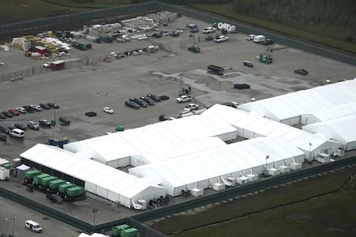 Work progresses on a new migrant detention facility dubbed "Alligator Alcatraz," at Dade-Collier Training and Transition facility in the Florida Everglades, Friday, July 4, 2025, in Ochopee, Fla. (AP Photo/Rebecca Blackwell)
