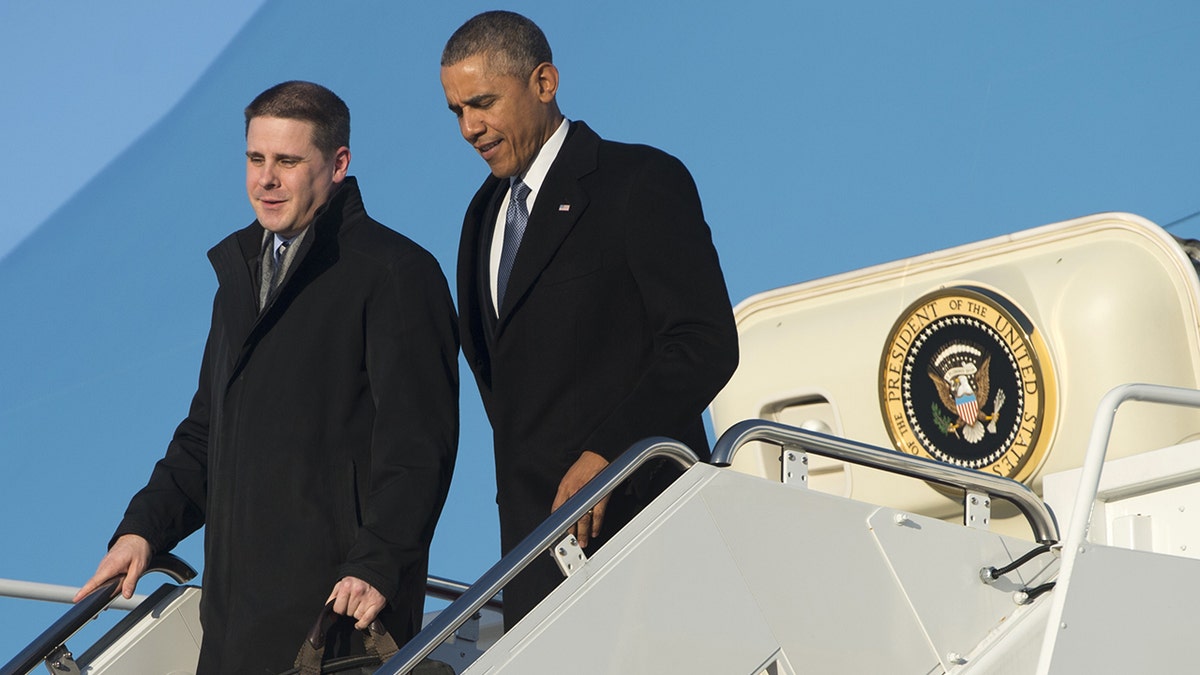 Pfeiffer and Obama disembark Air Force One