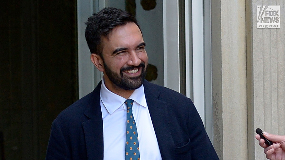 Zohran Mamdani closeup shot laughing