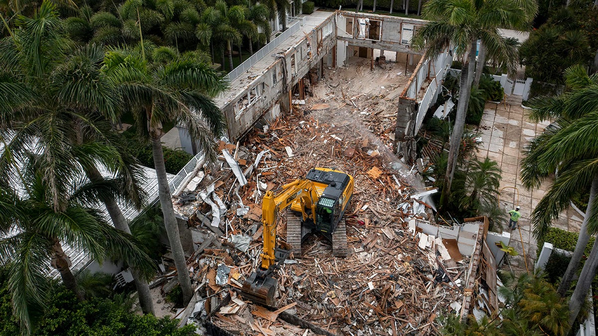 BG Group Demolition crews tear down the Palm Beach home of late financier and sex offender Jeffrey Epstein in Palm Beach, Fla. April 20, 2021.