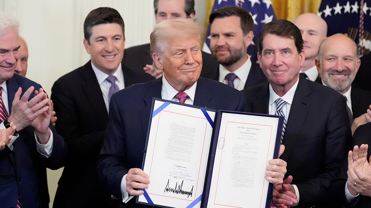 Trump holds Genius Act signing