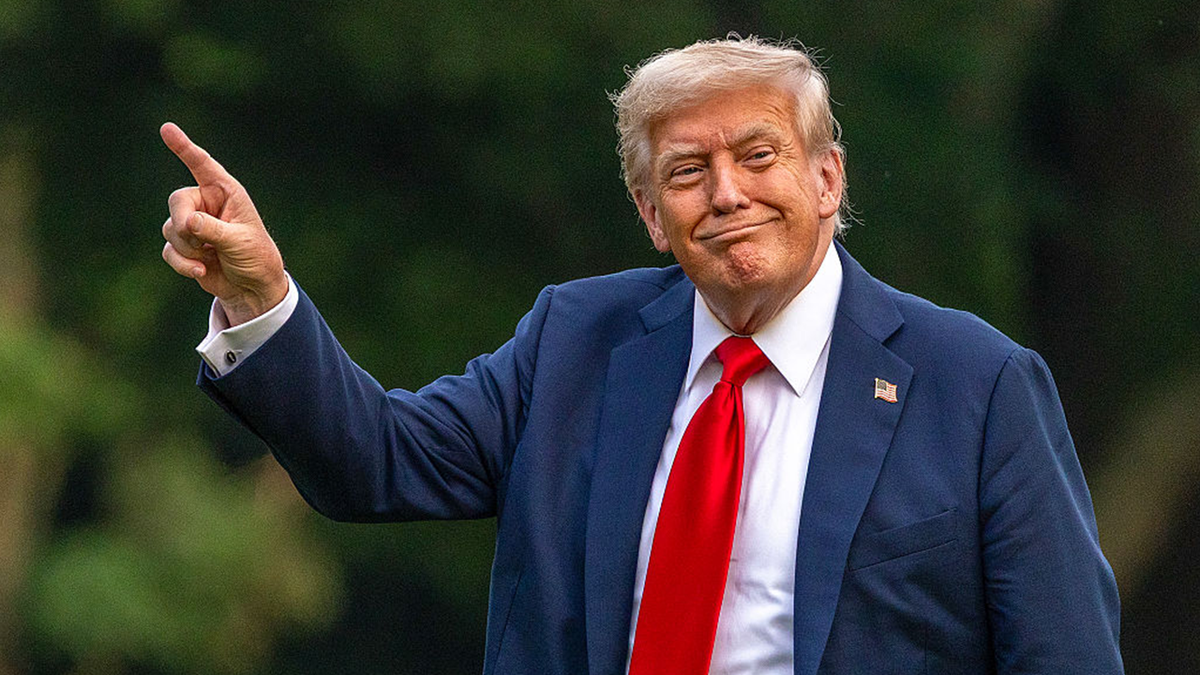 President Donald Trump walks on the south lawn