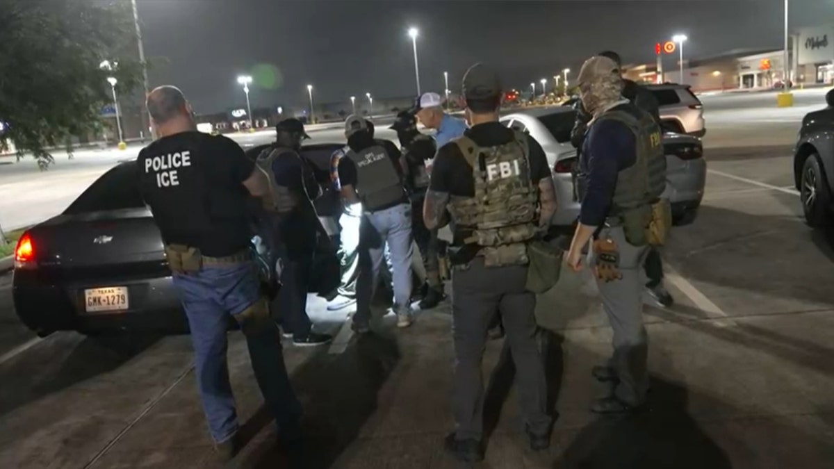 ICE officers with suspects being arrested