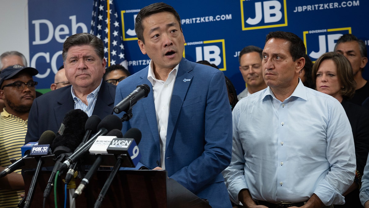 Gene Wu speaking amid other Texas Dem state lawmakers