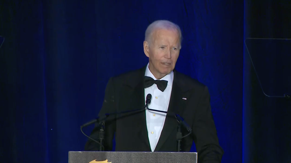 Biden speaking in black tie