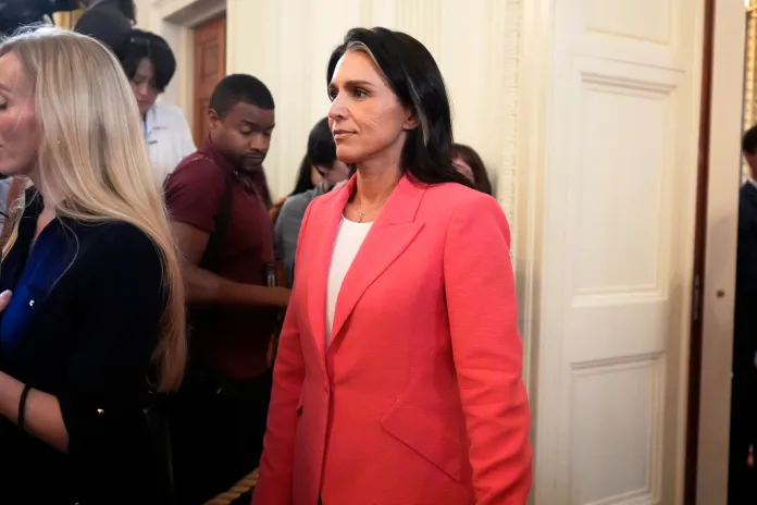 Director of National Intelligence Tulsi Gabbard arrives before President Donald Trump speaks at an event to mark National Purple Heart Day in the East Room of the White House, Thursday, Aug. 7, 2025, in Washington.