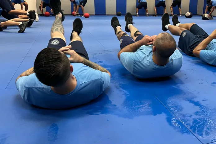 Recruits for Immigration and Customs Enforcement undergo a strength training workout routine at the Federal Law Enforcement Training Center in Glynco, Georgia, on Aug. 21, 2025.