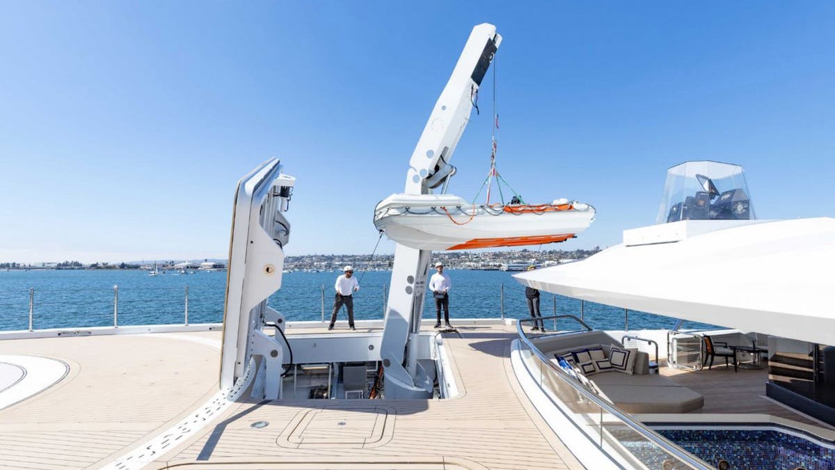 A tender above Amadea's deck