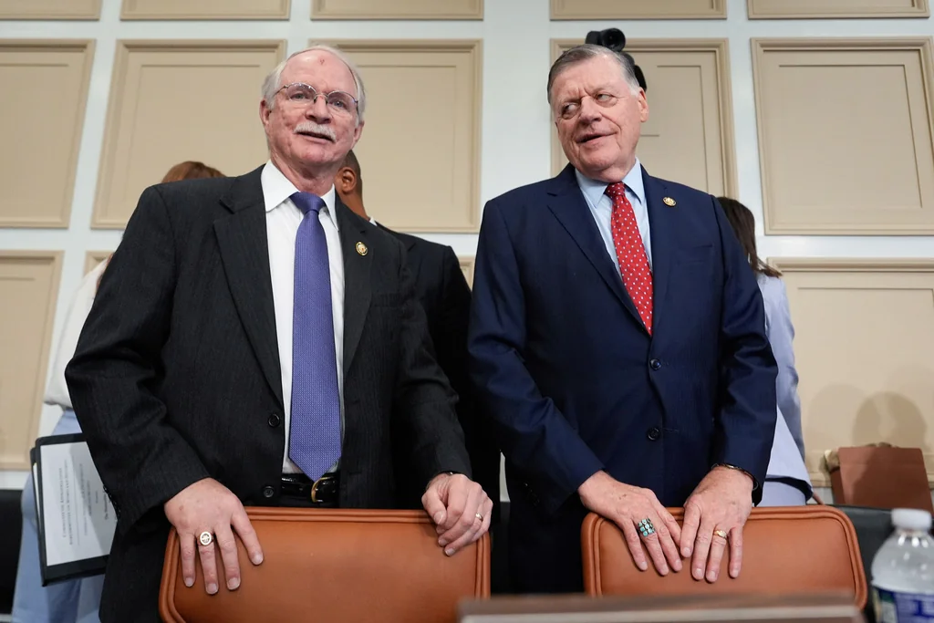 Rep. Tom Cole, R-Okla., right, and Rep. John Rutherford, R-Fla., left, talk before a House Appropriations Subcommittee on Homeland Security oversight hearing, Tuesday, May 6, 2025, on Capitol Hill in Washington. (AP Photo/Julia Demaree Nikhinson)