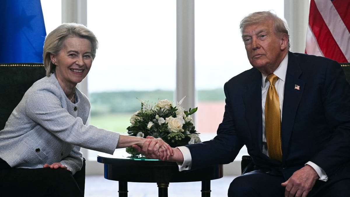 President Donald Trump shakes hands with European Commission President Ursula von der Leyen