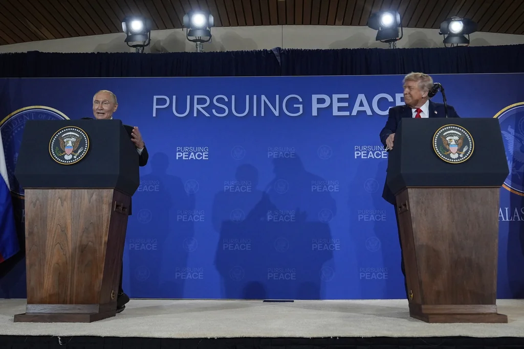 President Donald Trump and Russia's President Vladimir Putin speak during a news conference at Joint Base Elmendorf-Richardson, Alaska, Friday, Aug. 15, 2025. (AP Photo/Julia Demaree Nikhinson)