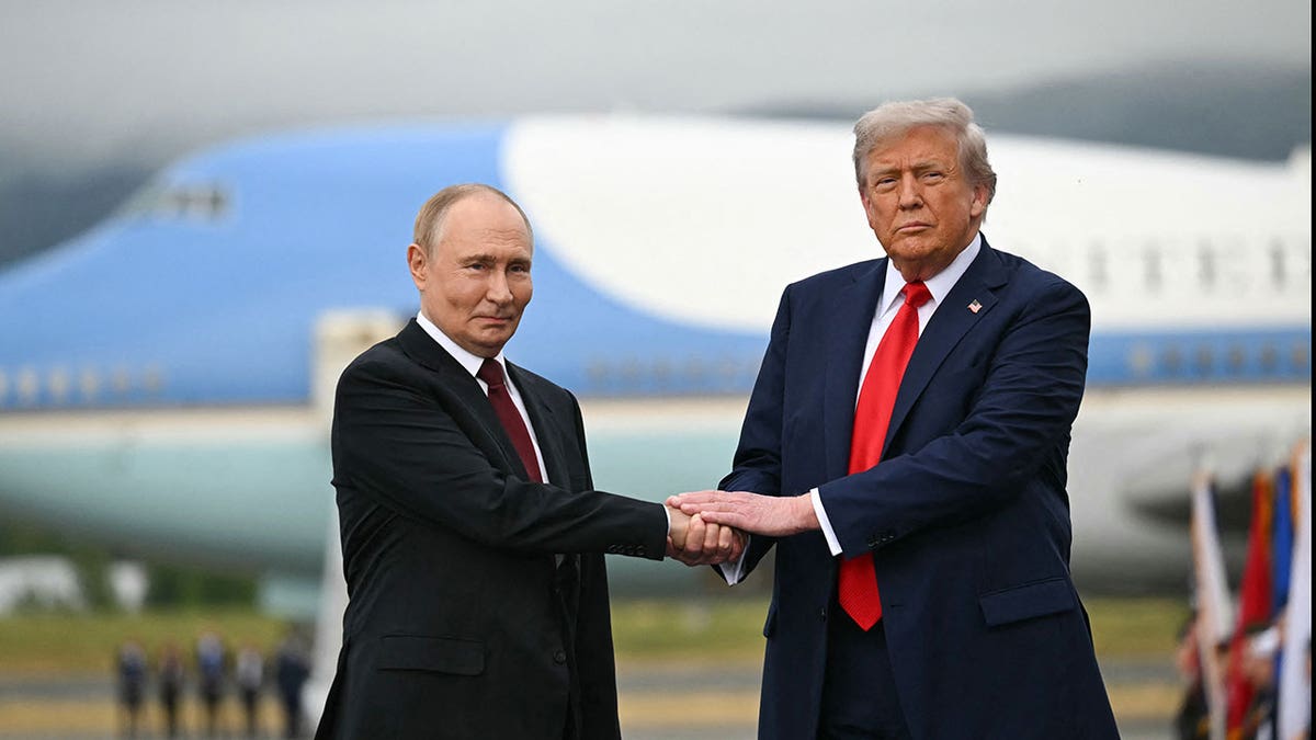 Trump and Putin greet each other in Alaska