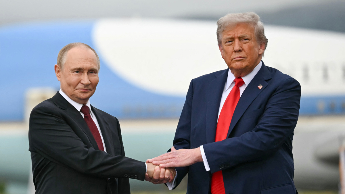President Donald Trump and Russian President Vladimir Putin shake hands in Alaska