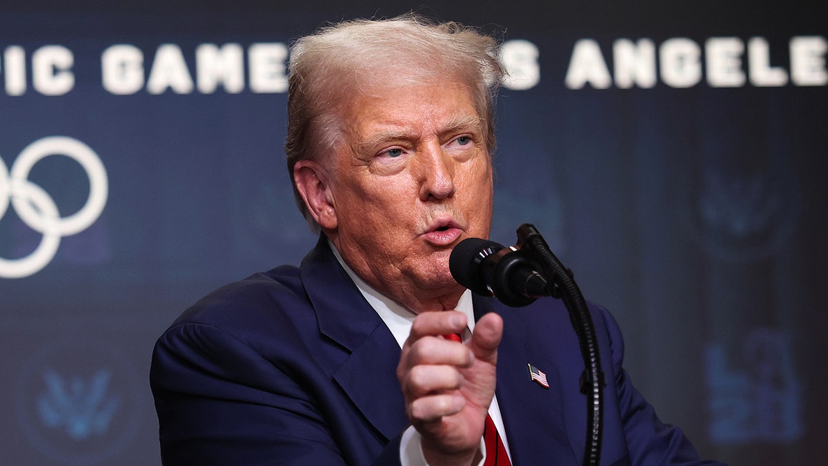 Trump speaks to reporters inside White House