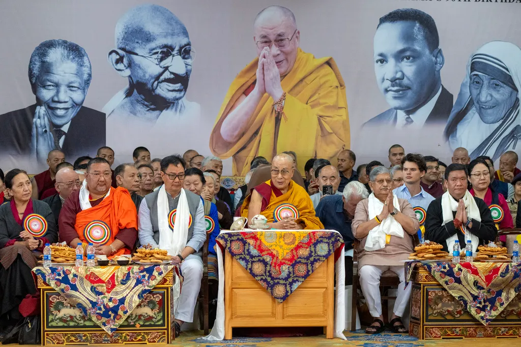 Tibetan spiritual leader the Dalai Lama, center, presides over his 90th birthday celebrations at the Tsuglakhang temple in Dharamshala, India, Sunday, July 6, 2025. (AP Photo/Ashwini Bhatia)