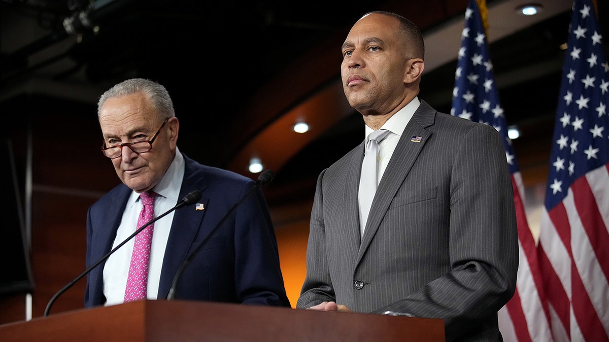 Schumer, left, next to Jeffries