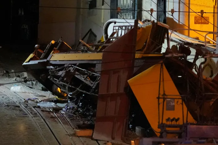 View of the site of a derailed electric streetcar in Lisbon, Portugal, Wednesday, Sept. 3, 2025.